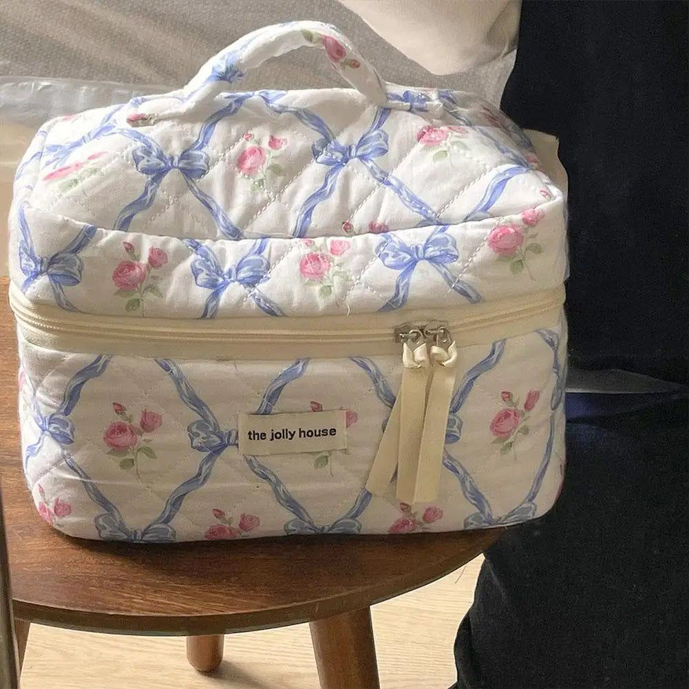 Trousse de maquillage matelassée à motif floral et nœud pour femme, organiseur de cosmétiques à fermeture éclair, sac à main en tissu, trousse de toilette portable pour filles